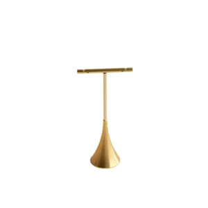 Espositore per orecchini minimalista in metallo dorato con supporto a T e base