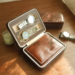 Detail view of open vintage brown leather watch travel case with secure zipper