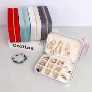 Compact portable velvet jewelry organizer box with multi-compartments for travel storage