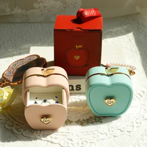 Elegant apple-shaped jewelry gift box for rings and necklaces in pink and mint green