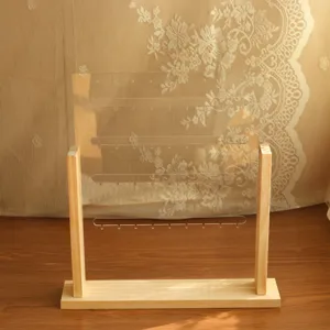 Professional vertical wood and acrylic earring display stand with notches for jewelry storage