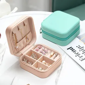 Elegant portable travel jewelry organizer box with soft velvet lining for rings and necklaces
