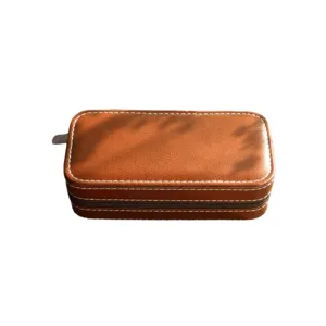 Portable vintage brown leather watch storage box with zipper and white stitching