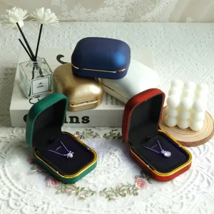 Detailed view of elegant jewelry boxes in various colors for necklaces and pendants