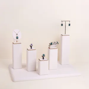 Professional off-white microfiber jewelry display stand set showing elegant necklace and rings