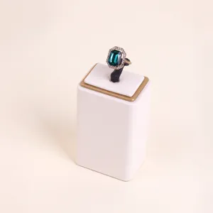 Elegant off-white microfiber jewelry display stand pillar for ring showcase detail