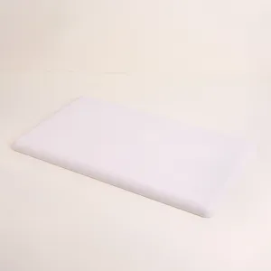 Close-up view of a professional off-white microfiber jewelry display board with rounded edges