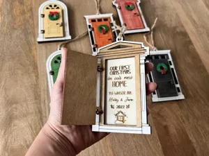 Miniature wooden Christmas door ornament, festive fairy garden decor with openable design.