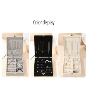 Jewelry storage boxes collection featuring gray black and beige velvet organizers
