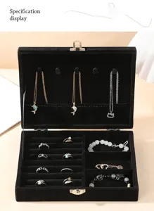 Detail view of large capacity jewelry box interior with necklace hooks and ring slots