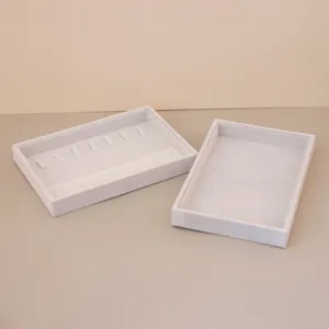 Minimalist gray velvet jewelry trays for elegant necklaces and ring storage display
