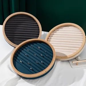 Premium bamboo circular jewelry display tray with velvet slots for ring and earring storage