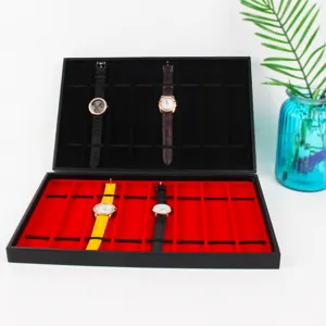 10-slot black watch display tray with red velvet lining for jewelry and watch storage.