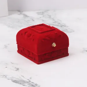 Luxurious red velvet jewelry box with embossed floral patterns for rings and gift
