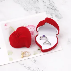 Luxurious red heart-shaped velvet ring box with rose relief for wedding and proposal