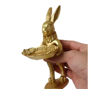 Vintage golden rabbit figurine with tray for jewelry display and photography