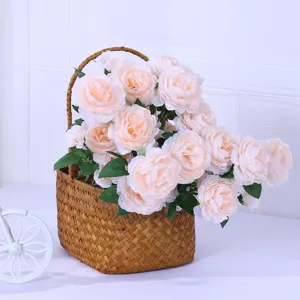 Artificial peony flower detail view, beautiful floral arrangement in woven basket for home decor.