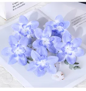 Künstliche blaue Orchideenblüten Köpfe Detail für DIY Hochzeitskränze, Corsagen und Geschenke.