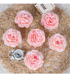 Kunstmatige roze ranonkel bloemhoofdjes voor huwelijksdecoratie en bloemstukken knutselprojecten.
