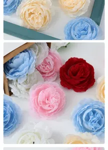 Detailed shot of colorful artificial ranunculus flower heads for wedding and home decor.