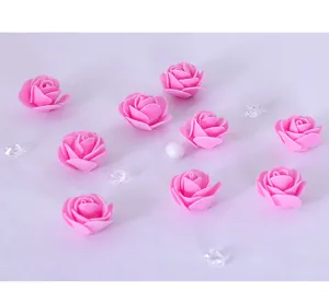 Testine di rose in schiuma artificiale rosa 3.5cm dettaglio primo piano per decorazione matrimonio.