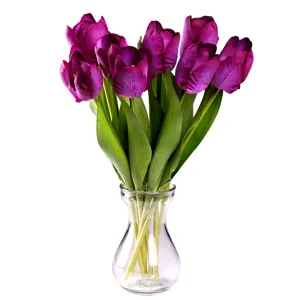 Artificial purple tulip flowers bouquet in a clear glass vase for home decor wedding gift.