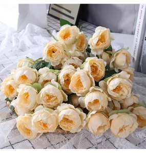 Champagne artificial peony silk flowers bouquet detail shot, perfect for elegant home decoration.