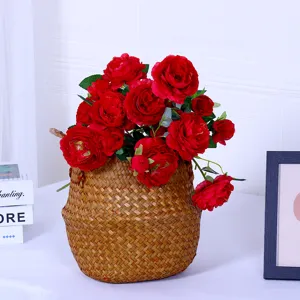 Artificial rose flower bouquet with woven basket pot, ideal for home living room decor.