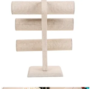 Detailed macro view of the 3-tier linen fabric jewelry display stand for bracelets.