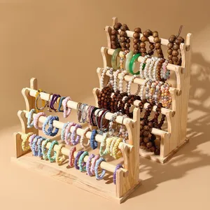 Espositore in legno massiccio a più livelli per bracciali e accessori per capelli chic
