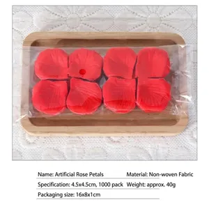 Artificial rose petals made of non-woven fabric, 1000 pieces per pack for wedding decoration.