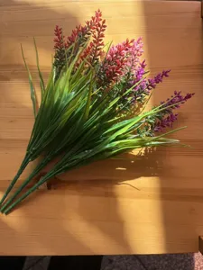 Detail shot of colorful artificial lavender bouquet plastic flower home decor photography prop.