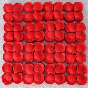 Red artificial rose petals for wedding decoration, non-woven fabric romantic party decor.
