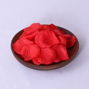 Artificial red rose petals for wedding bridal room decoration, wedding party table scatter decor.