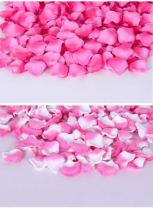 Artificial rose petals detail shot, pink and white gradient for wedding room decoration.