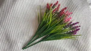 Artificial lavender flower detail, plastic plant bouquet for home decor and props.