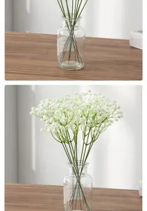 Artificial gypsophila flowers bouquet with glass vase for home decor and wedding party.