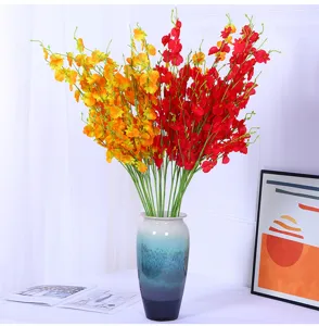 Artificial dancing orchid flower bouquet with ceramic vase for home living room tabletop decor.
