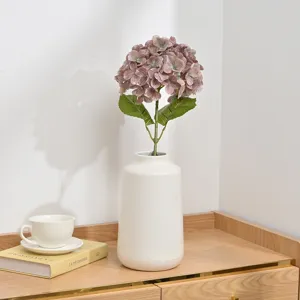 Artificial hydrangea flower detail scene, elegant pink purple floral decor for home.