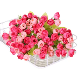 Artificial rose flower bouquet with white wire basket, perfect for home decor and floral arrangements.