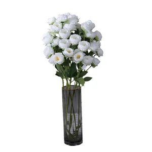Artificial white peony flower bouquet with grey glass vase for home wedding decoration.