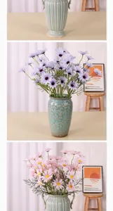Künstlicher Gänseblümchen Blumenstrauß Detailansicht, elegante Heimdeko in Vintage Vase.