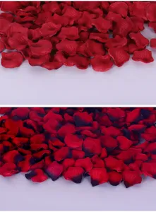 Detail shot of artificial red rose petals, non-woven fabric material for wedding room decoration.