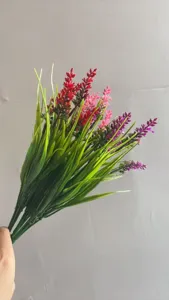 Close up detail of artificial lavender flower bouquet plastic plant for home decor photography prop.