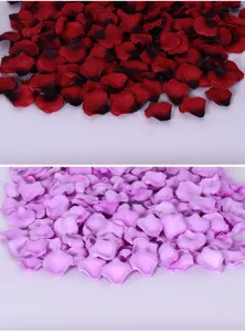 Detailed closeup view of artificial rose petals in red and purple for wedding setup.