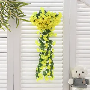 Fausse vigne de fleurs jaunes suspendue pour déco murale de maison, balcon et mariage.