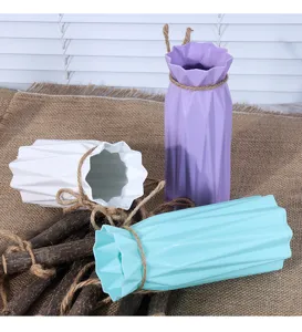 Modern minimalist plastic vase set, geometric origami design with cute twine decor details.
