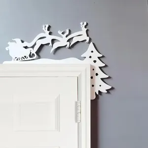 Christmas Santa Claus and reindeer door corner decoration, white wooden festive home decor scene.