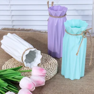 Modern plastic flower vase for home decor, break-resistant decorative vase with rope.