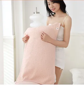 Pink waffle knit pillow towel soft breathable cotton bedding cover for student dorm home.